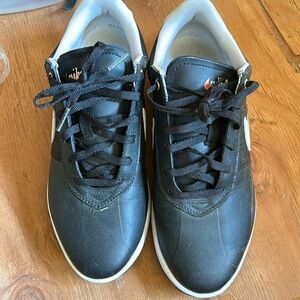 Nike shoes, lightly worn. Black and white Nike Golf Shoes.